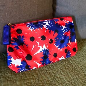 Estee Lauder Daisy make up bag in red and blue
